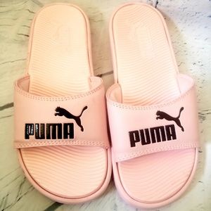 light pink puma slides